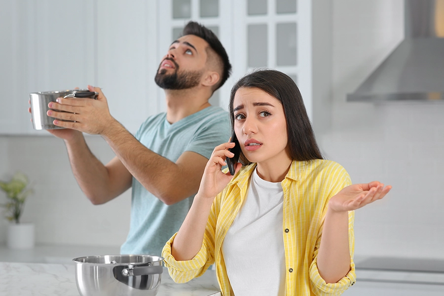 Homeowners in the Central, IL area experiencing a water leak in their home calling an emergency roof repair service to repair their damaged roof.