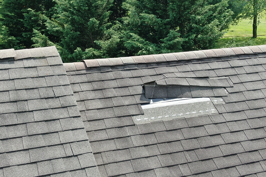 A home received roof damage after a severe storm in Central IL.