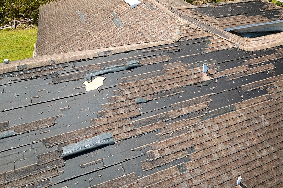 A severely damaged roof resulting after a strong storm passed through Pana, IL at the height of storm season.