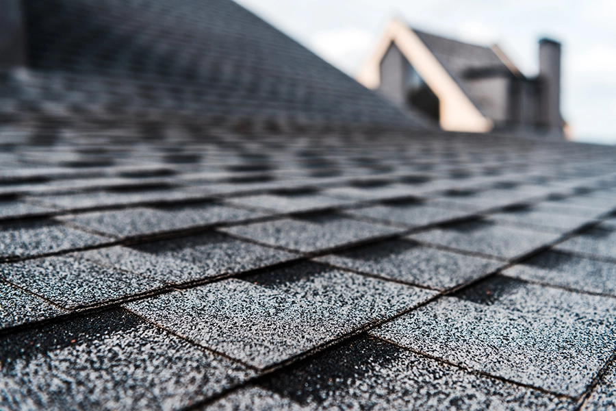 Up close picture of new shingles on a roof in Central, IL.