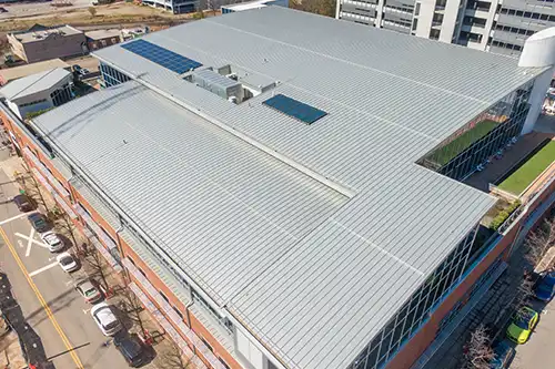 At Your Service Roofing—A business with a metal roof in Pana, IL.