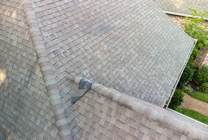 oof with hail damage and markings from inspection central illinois