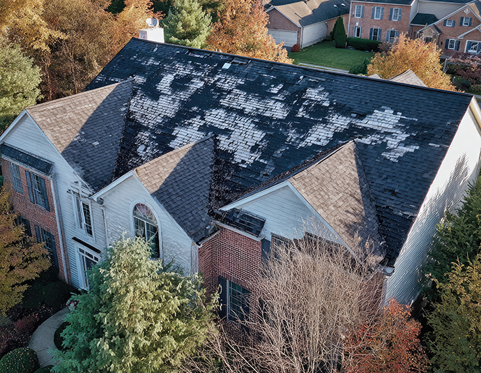 Roof with hail damage and inspection chalk markings central illinois