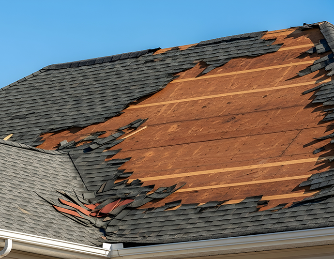 Severe Storm Damage with Missing Shingles and Exposed Plywood central illinois